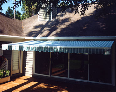 have a covered deck and sundeck in one space with retractable awnings